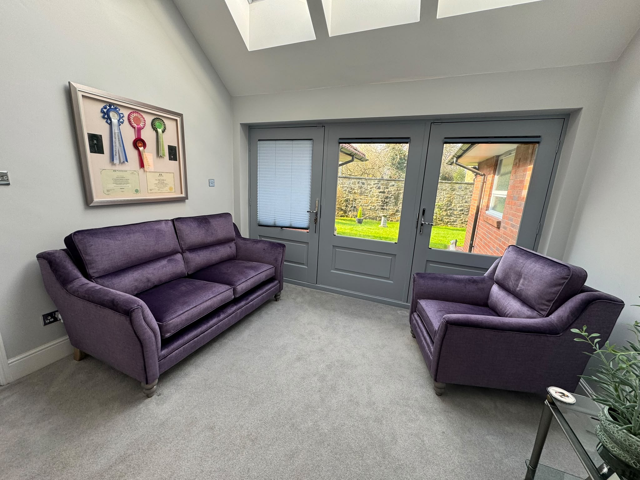 Purple sofas — after, view 1