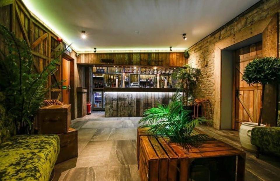 Alternate image looking towards the timber bar from the green seating area.